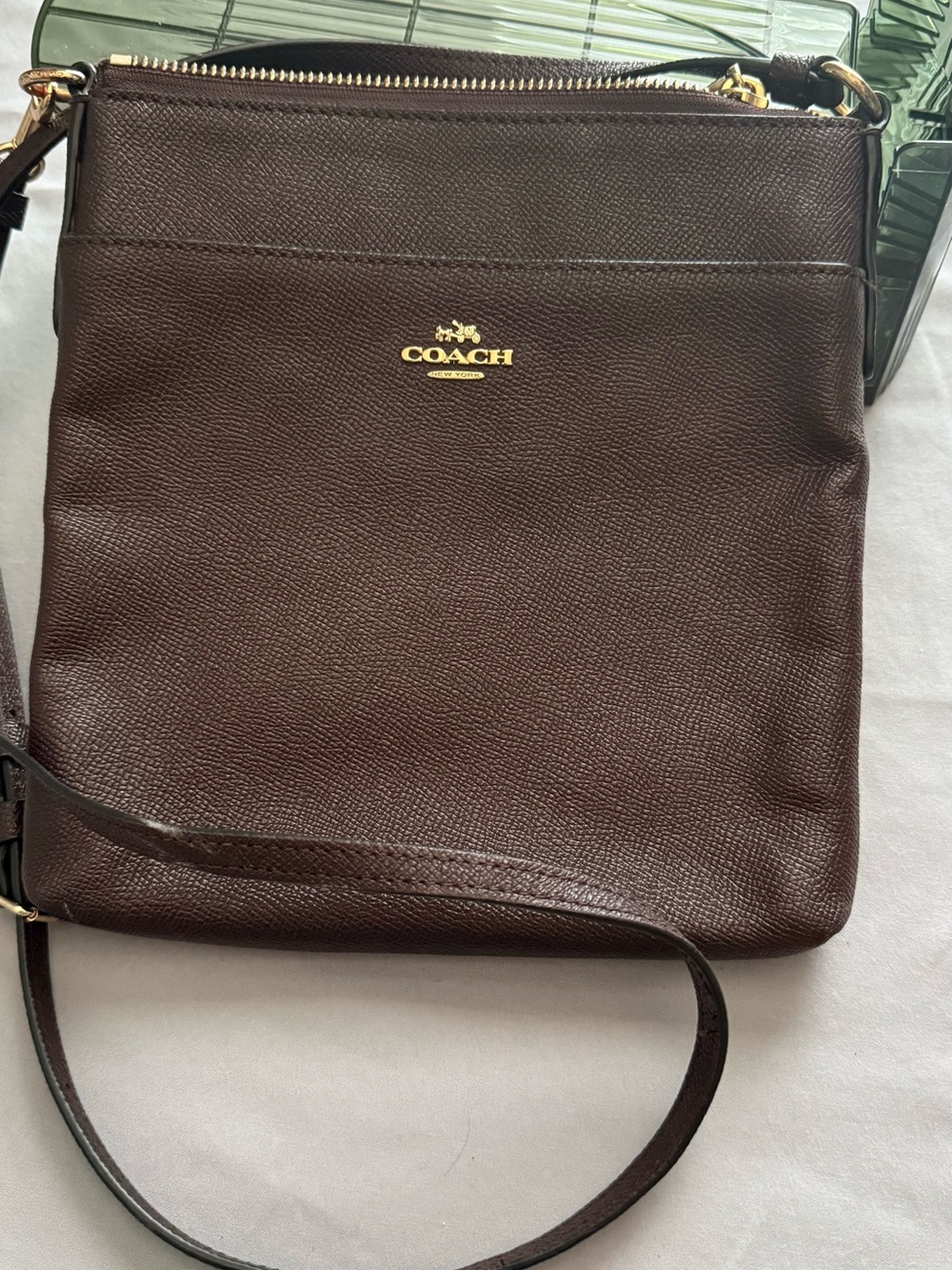 Coach burgundy Pebbled Leather Messenger with Gold Hardware